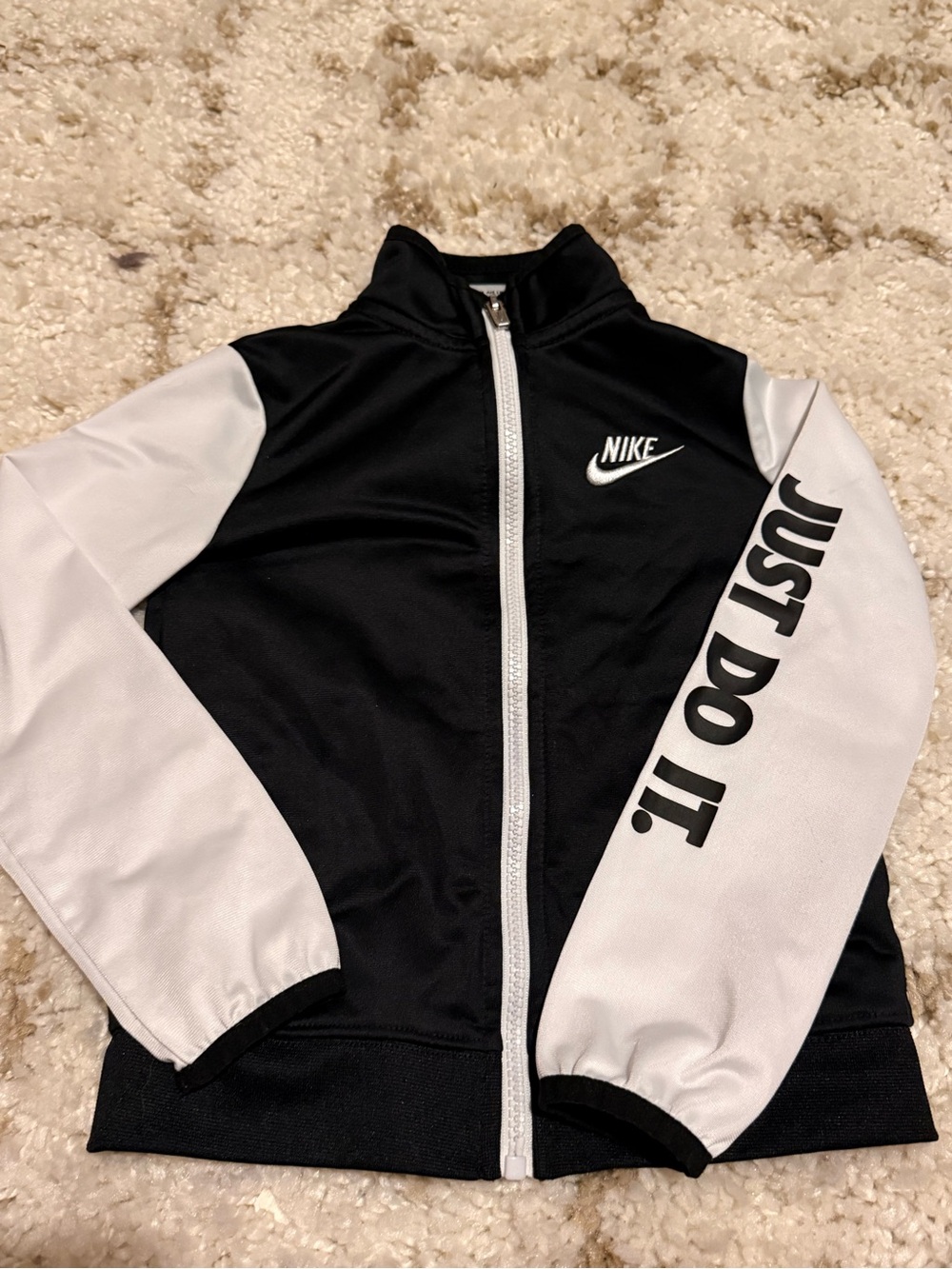 Nike Black and White Kids' Track Jacket with 'Just Do It.' Sleeve